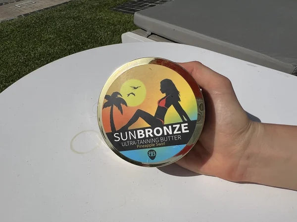 Sun Bronze jar in hand
